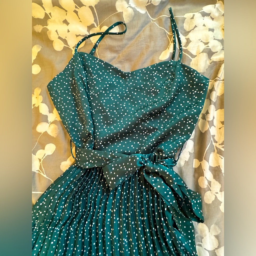 Never worn green midi dress with white polka dots. Size Medium. Cinched waist.